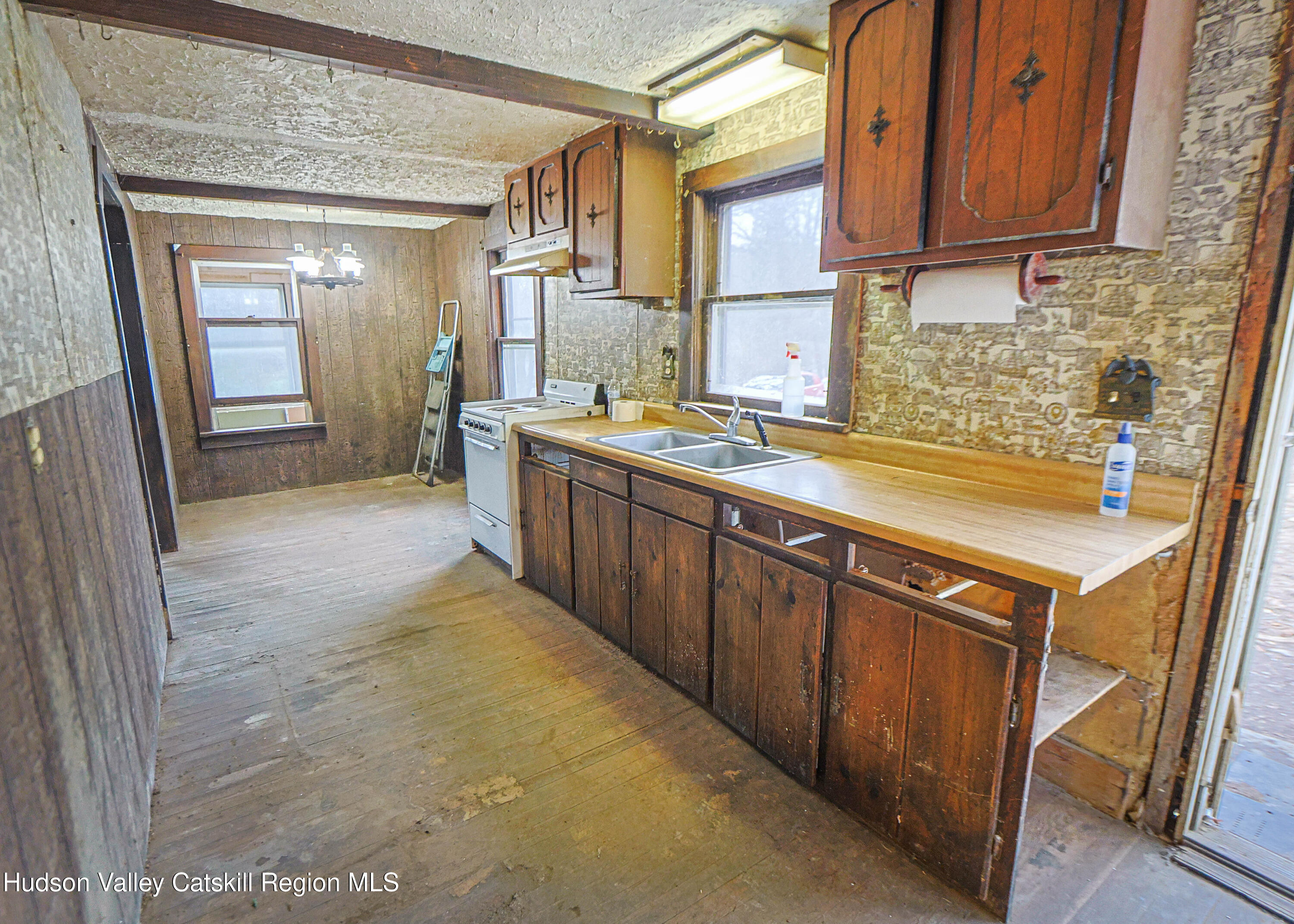 449 Spillway Road West Hurley, NY 12491 - Photo 14 of 42 a view of a kitchen with a sink
