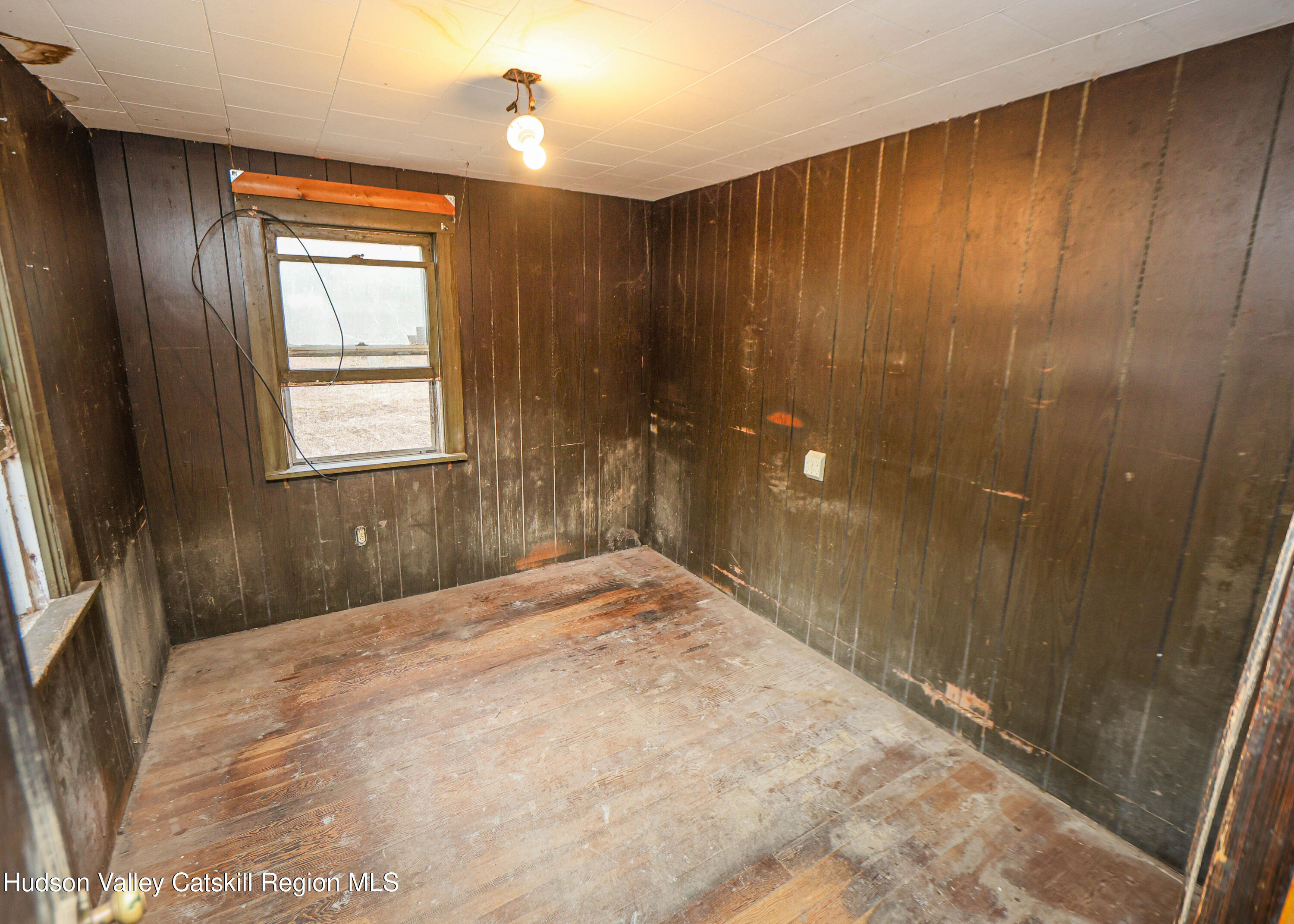 449 Spillway Road West Hurley, NY 12491 - Photo 21 of 42 a bathroom with a shower and a window