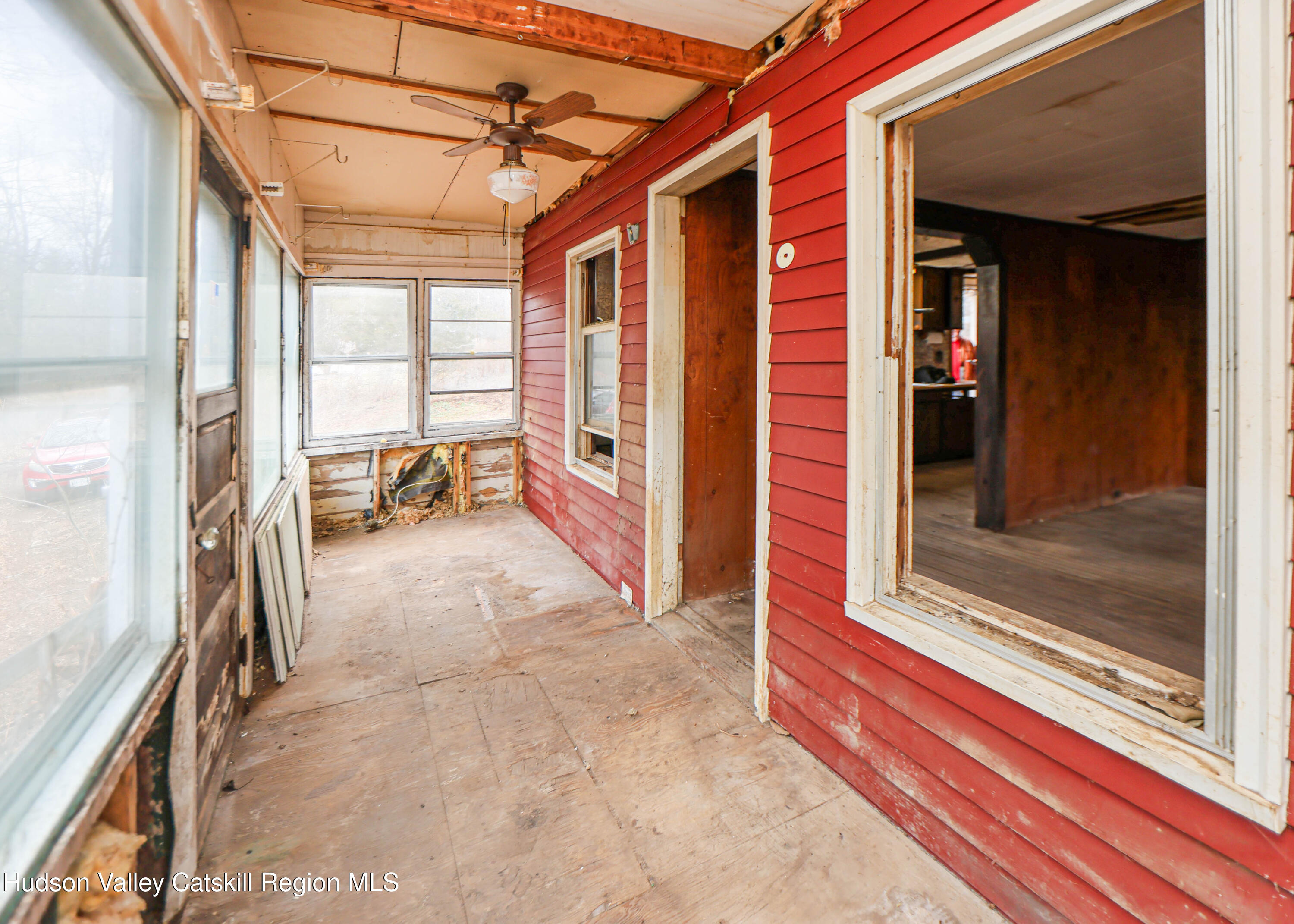 449 Spillway Road West Hurley, NY 12491 - Photo 22 of 42 a view of a porch with a door and a porch