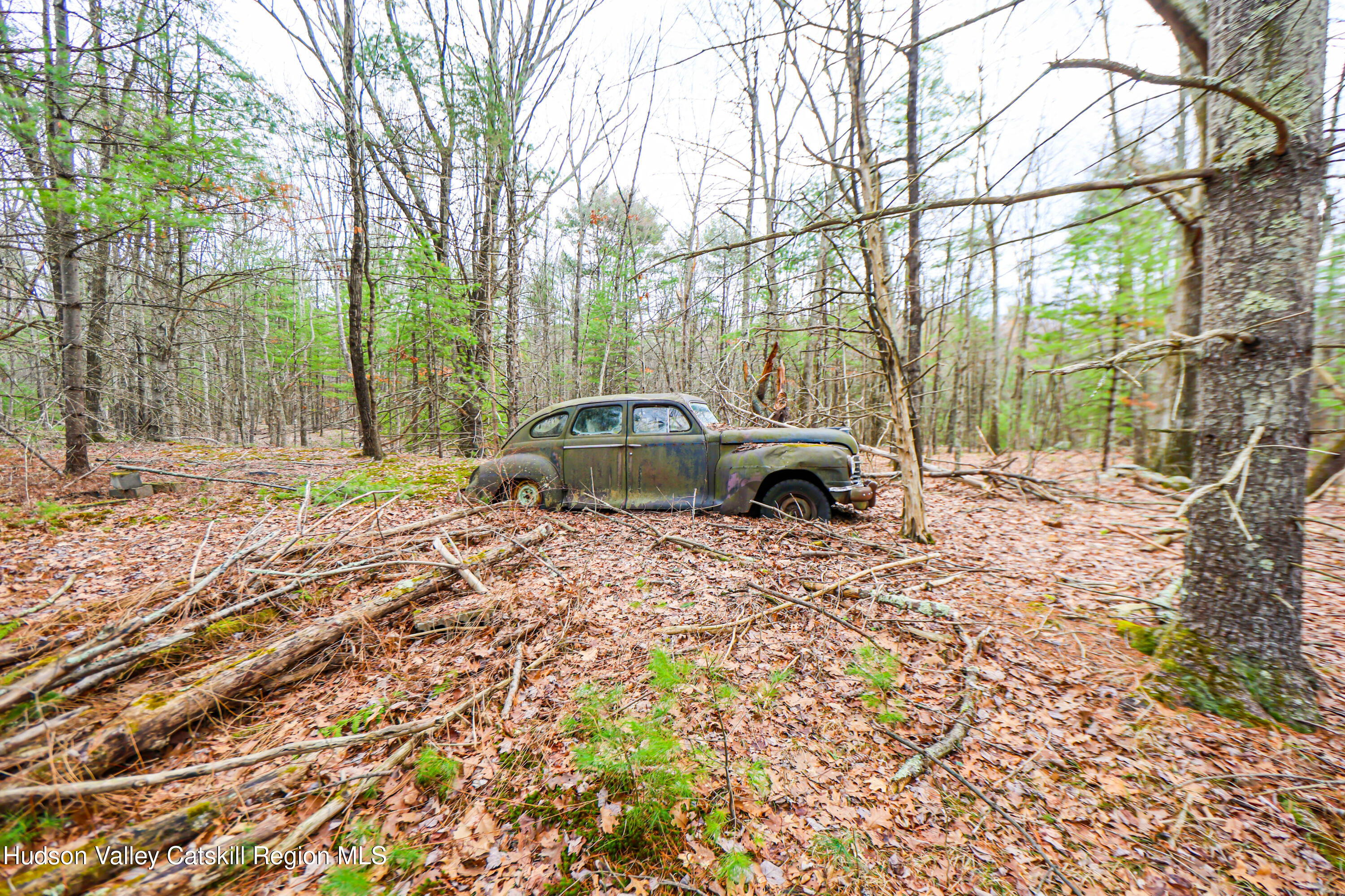 449 Spillway Road West Hurley, NY 12491 - Photo 27 of 42 a car parked in front of a house