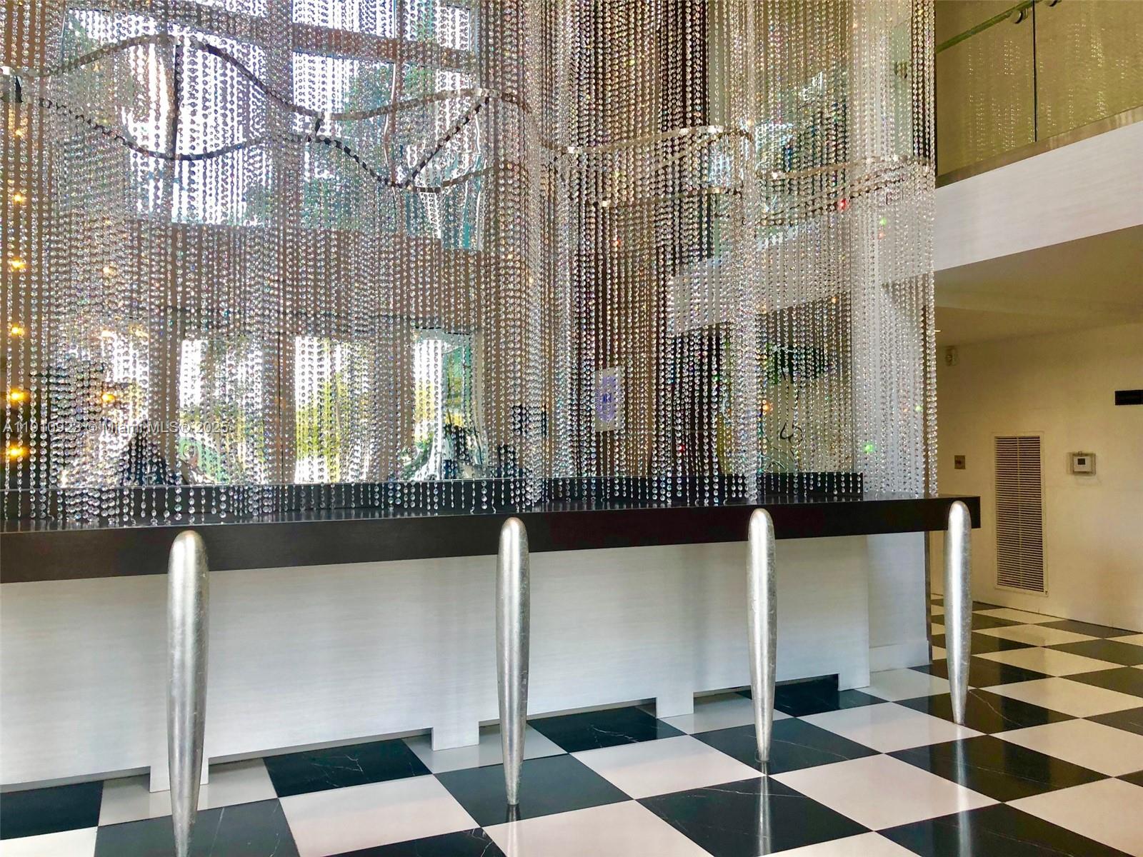 1800 North Bayshore Drive, Unit 605 Miami, FL 33132 - Photo 23 of 48 a view of a black and white checkered floor