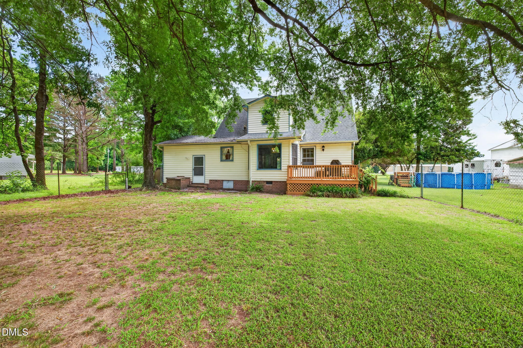 350 Grantham School Road Goldsboro, NC 27530 - Photo 32 of 49 a front view of a house with a yard and trees