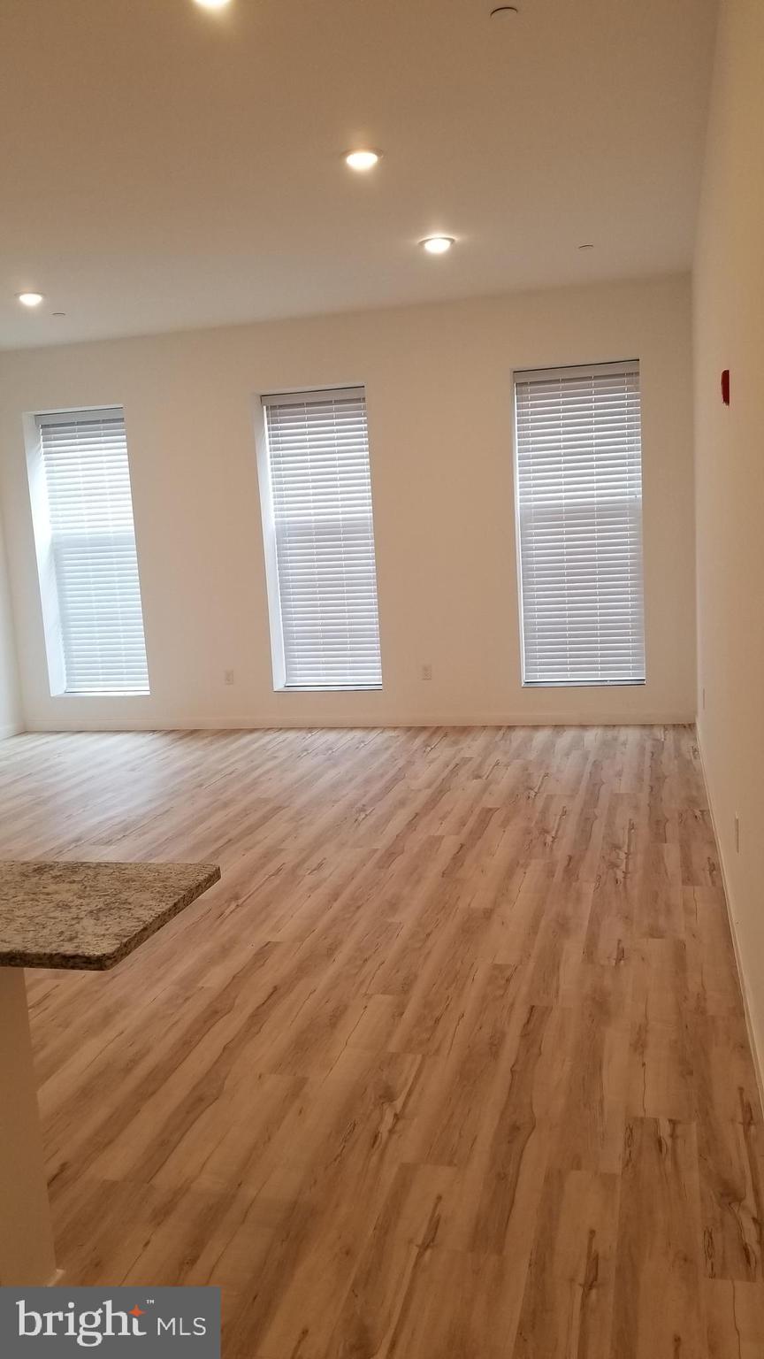 247 South 16th Street, Unit 5 Philadelphia, PA 19102 - Photo 2 of 10 a view of an empty room and window