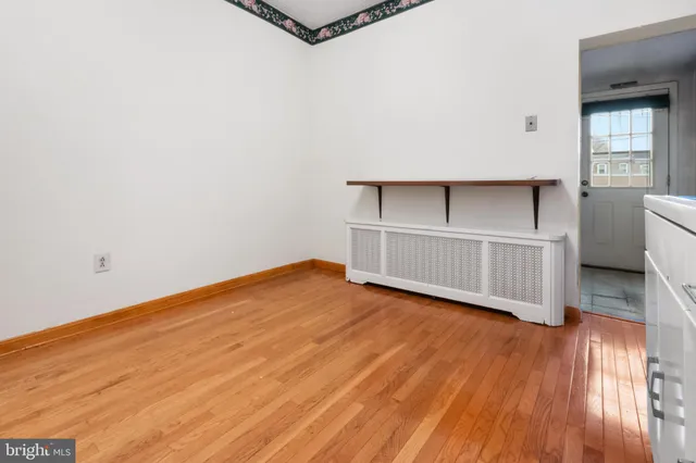 a view of a room with rack on the wall