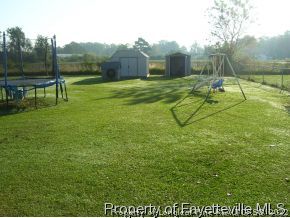 171 Eulon Loop Raeford, NC 28376 - Photo 3 of 10 a view of a backyard