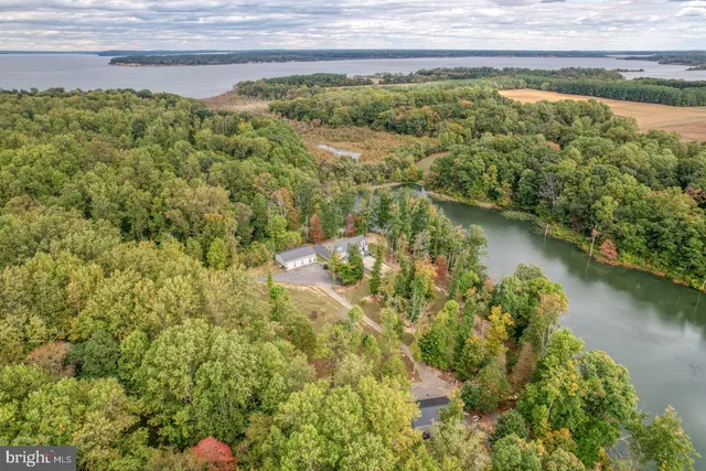 a view of a lake with a yard