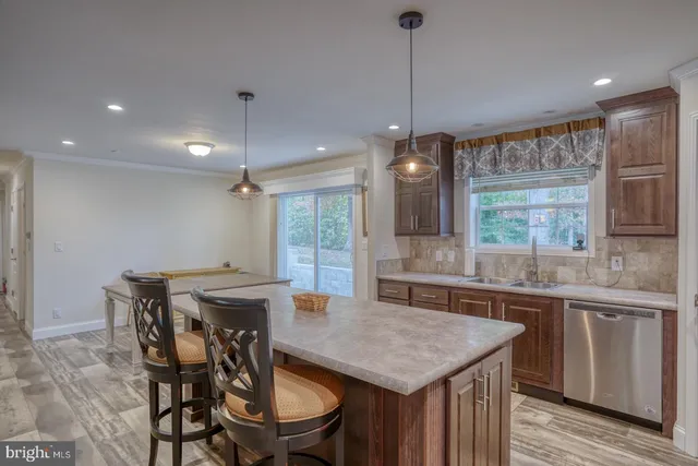 a bathroom with a granite countertop sink mirror and double