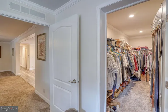 a bedroom with a bed and a cabinets