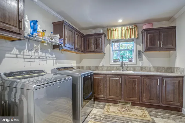 a lake with a tree in the background