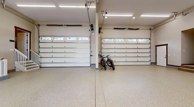 an aerial view of a house with outdoor space