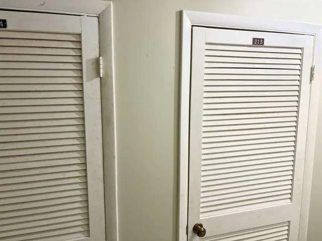 a view of a bedroom with a window