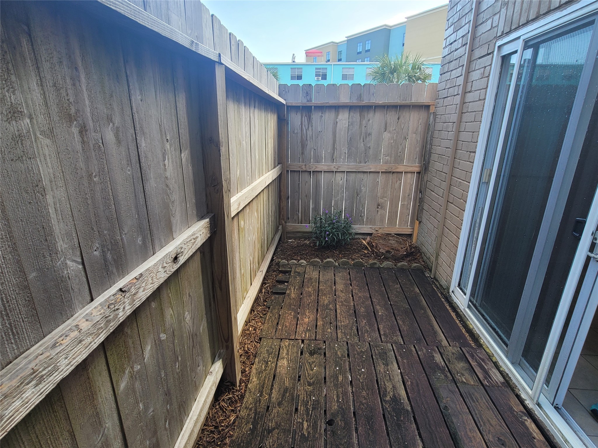 215 Postoffice Street, Unit 801 Galveston, TX 77550 - Photo 16 of 16 a view of wooden balcony