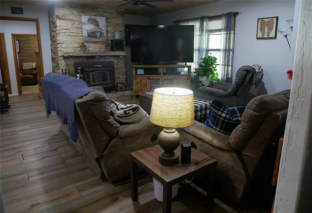 a stove top oven sitting inside of a kitchen