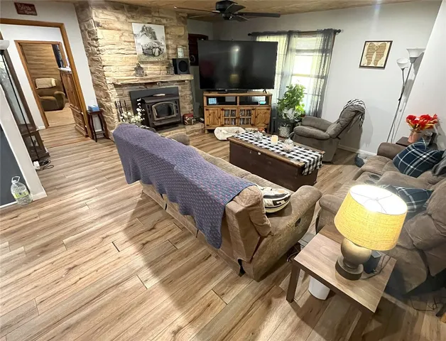 a living room with furniture and a rug