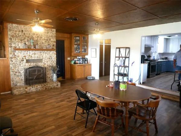 a stove top oven sitting inside of a room