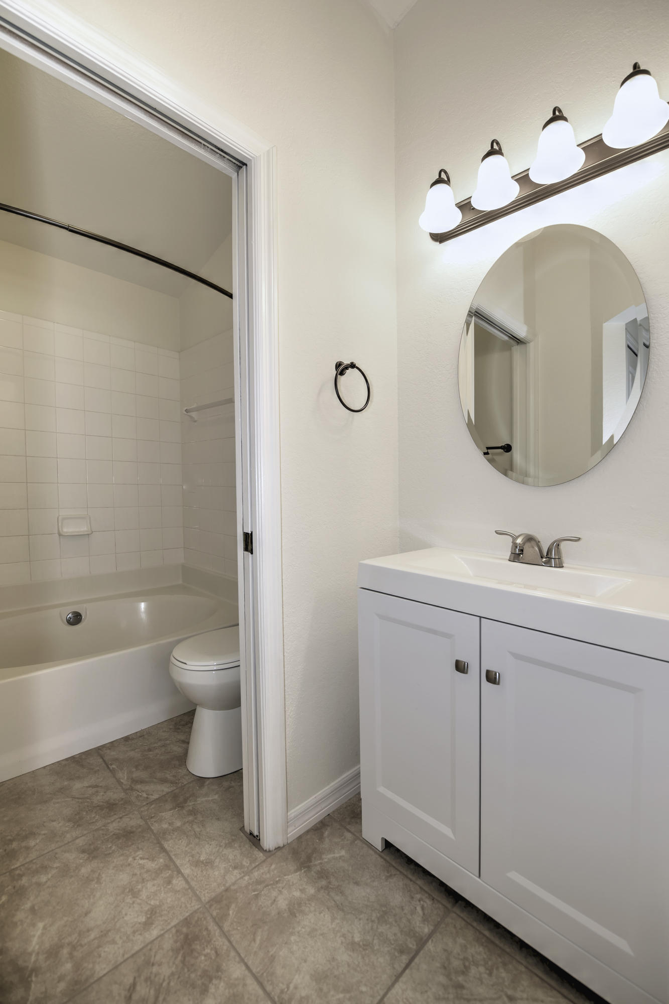 271 18th Street Southeast Naples, FL 34117 - Photo 15 of 28 a bathroom with a sink toilet and shower