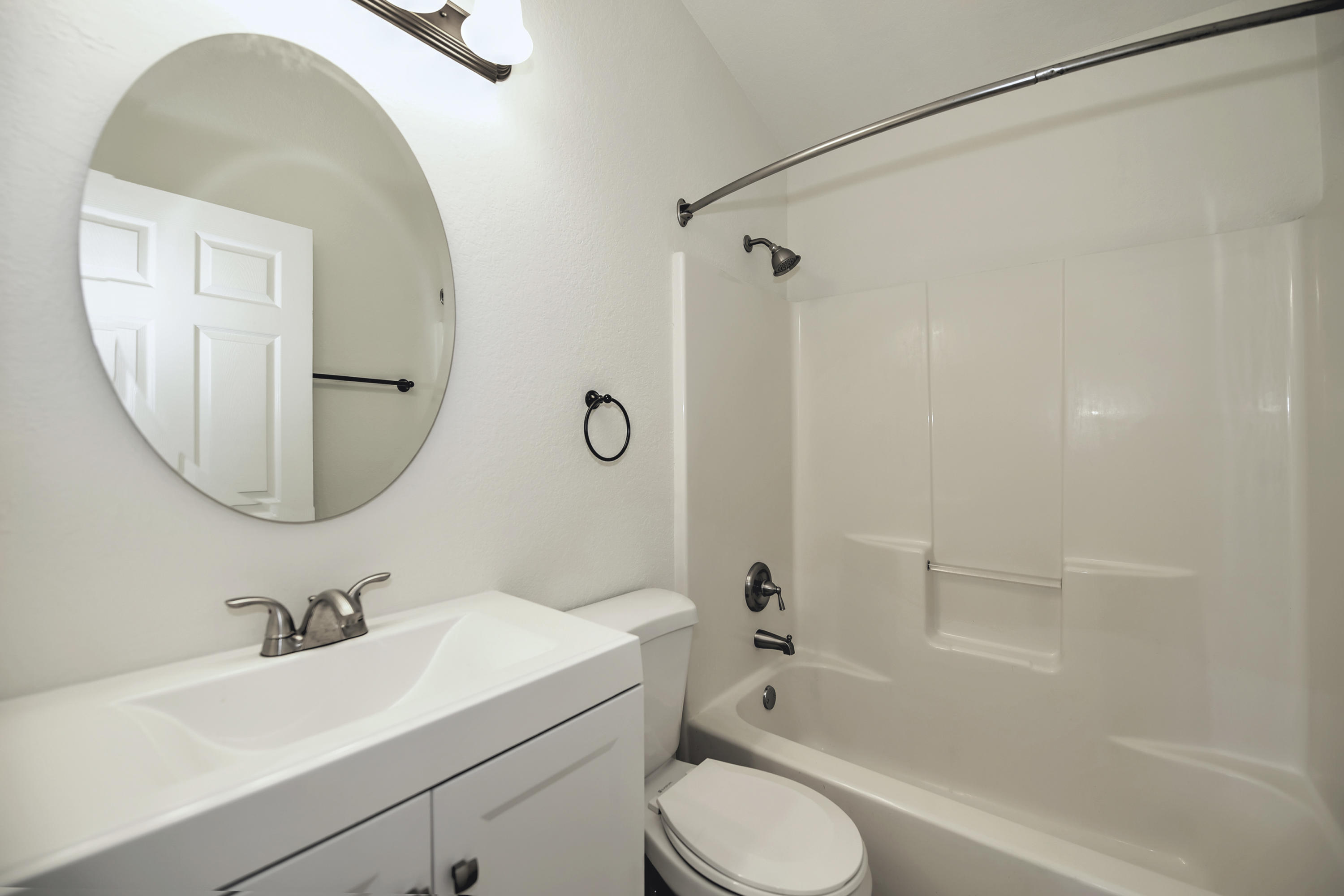 271 18th Street Southeast Naples, FL 34117 - Photo 18 of 28 a bathroom with a sink toilet and shower