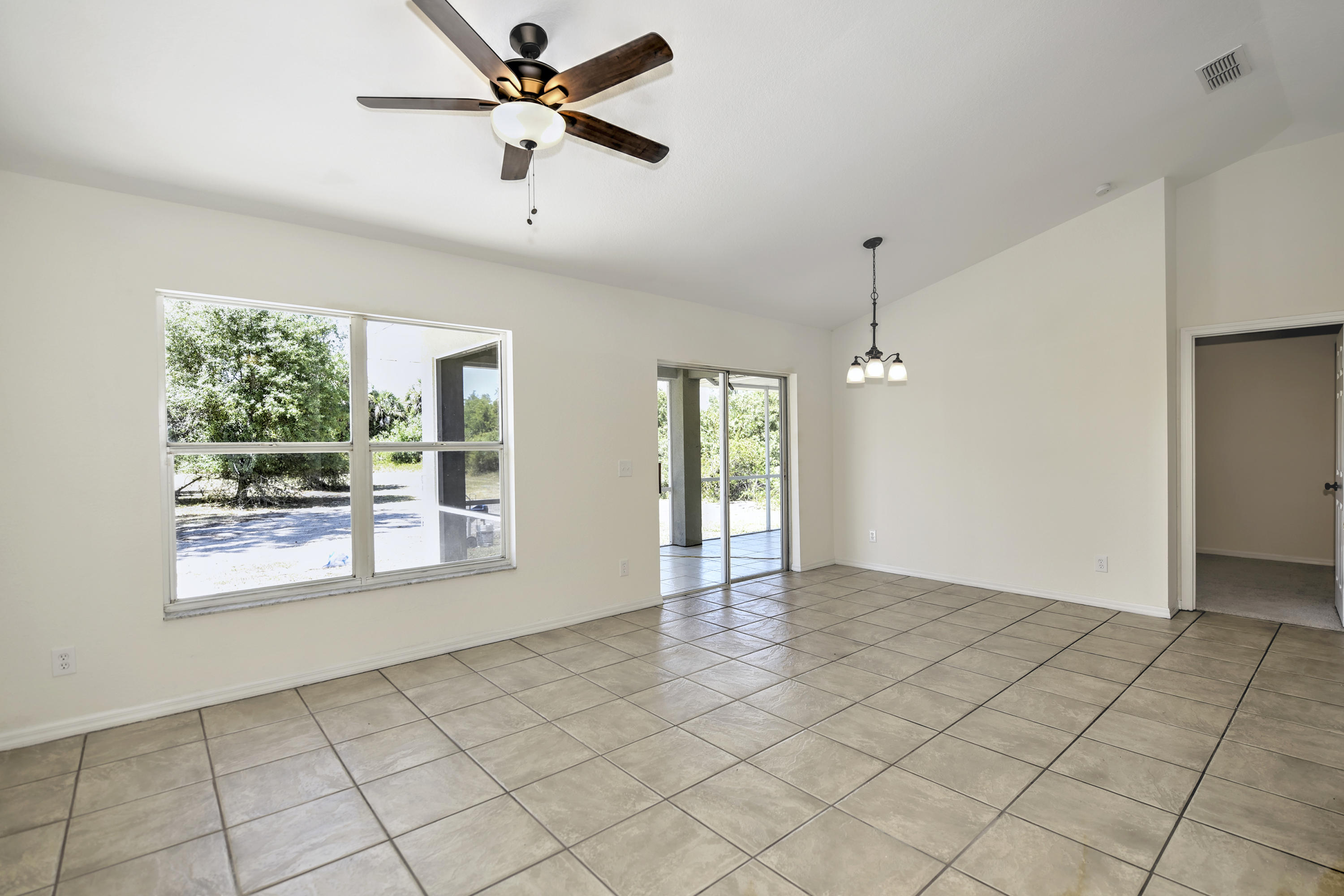 271 18th Street Southeast Naples, FL 34117 - Photo 22 of 28 a view of an empty room with a window
