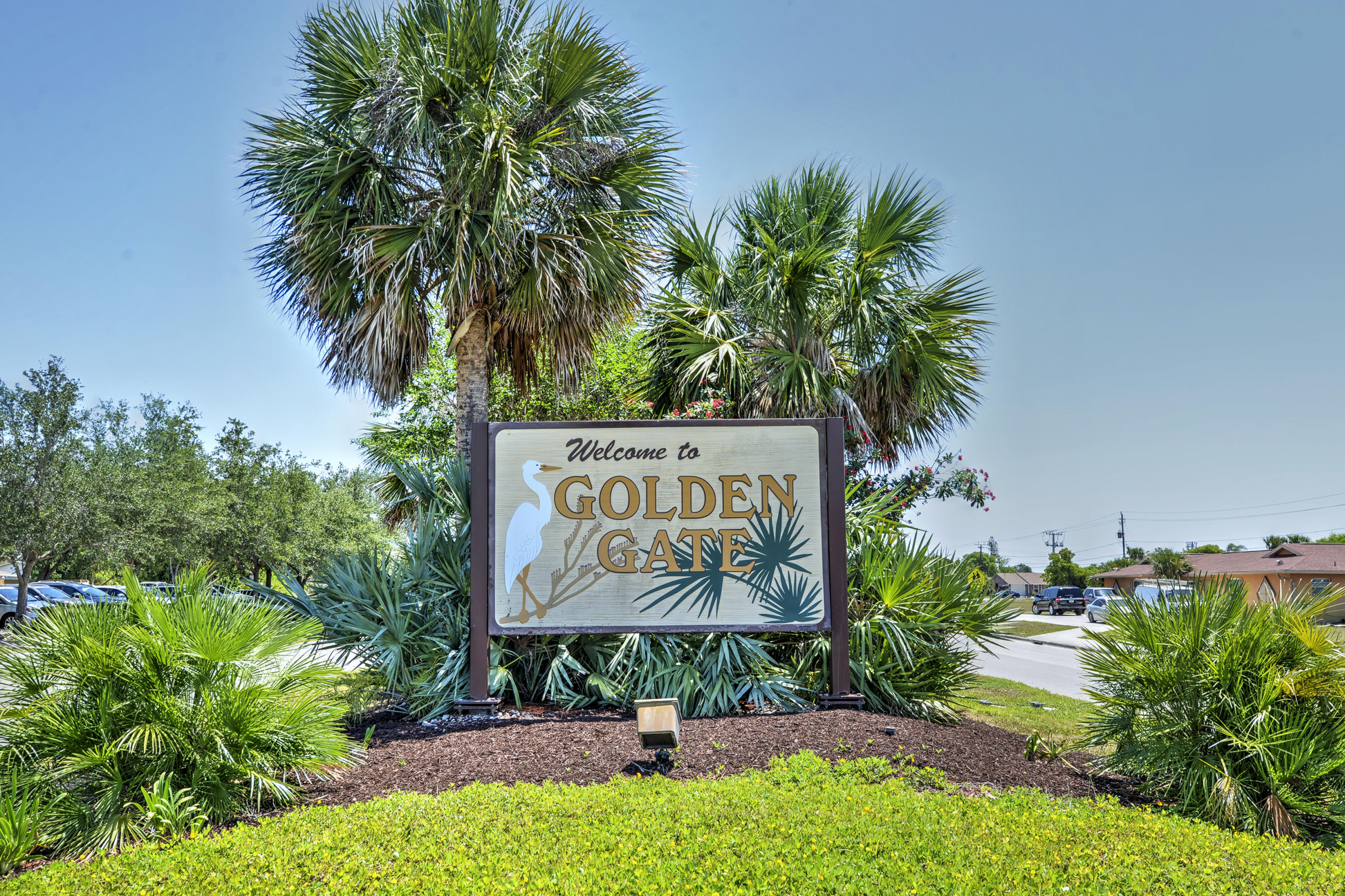 271 18th Street Southeast Naples, FL 34117 - Photo 28 of 28 a sign on the side of the road