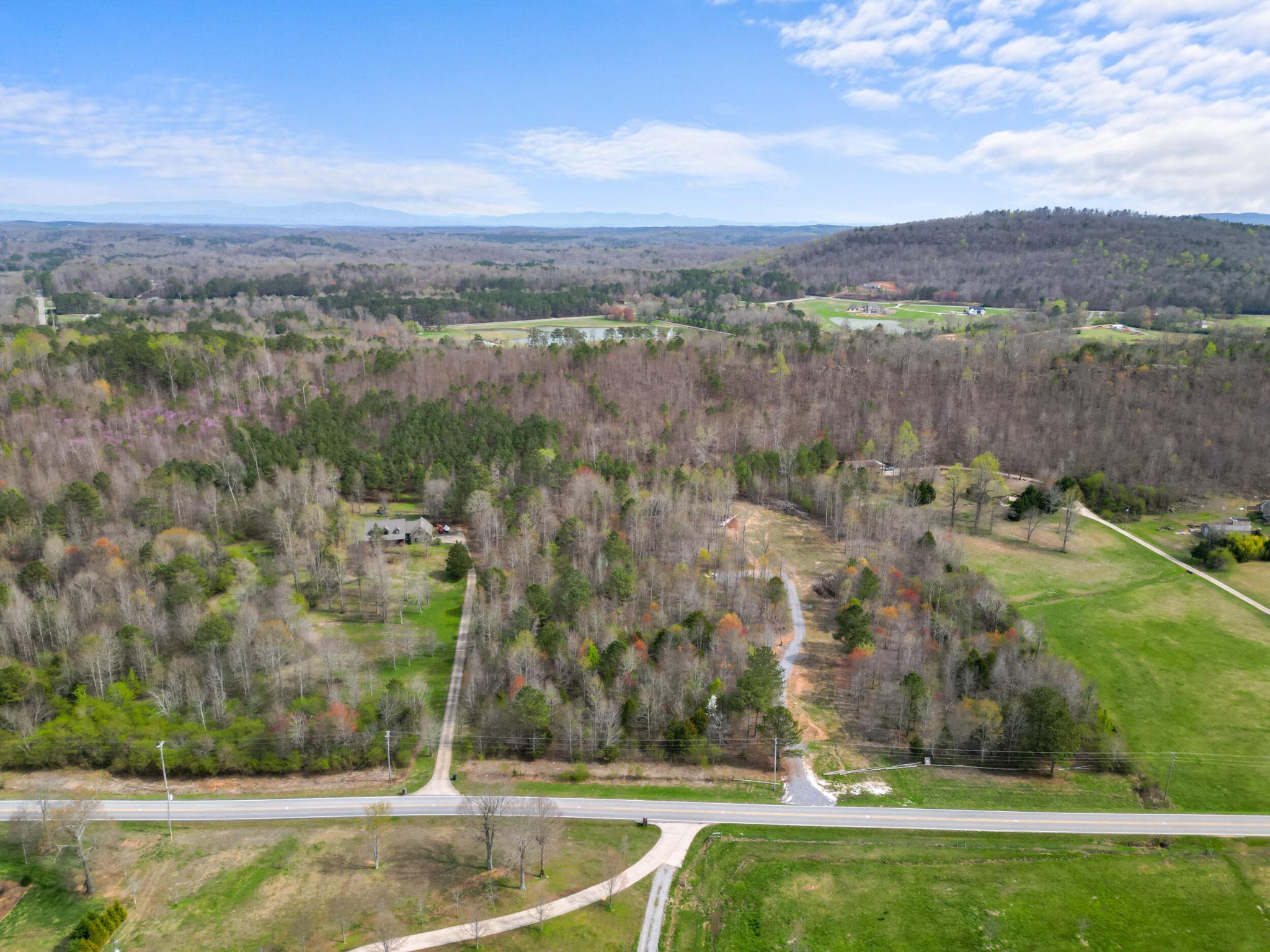 3354 Cherokee Valley Road Ringgold, GA 30736 - Photo 6 of 20 a view of a lake with a mountain in the background