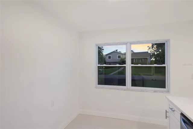 a view of balcony with furniture