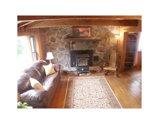 164 Sugarbush Road Latrobe, PA 15650 - Photo 2 of 18 Living Room. An evening by the fireplace watching the snow fly will create a warm and cozy atmosphere in this beautiful country style living room.