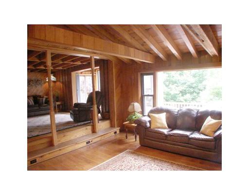 164 Sugarbush Road Latrobe, PA 15650 - Photo 3 of 18 Living Room. Cathedral ceilings, adorned by rustic beams and plenty of natural light, gives this living space much potential for the country in everyone.