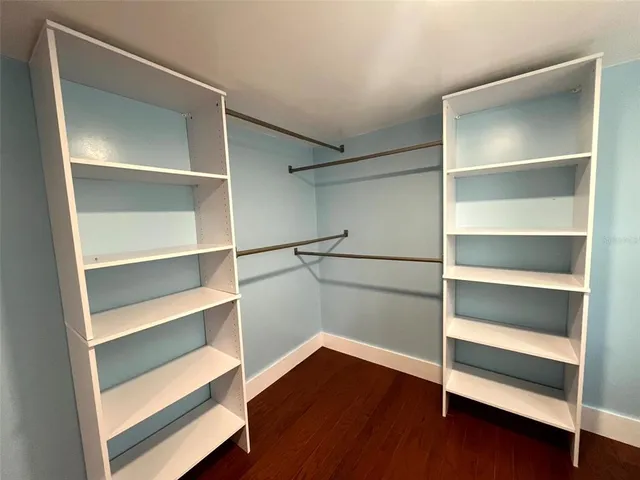 a view of an empty walk in closet
