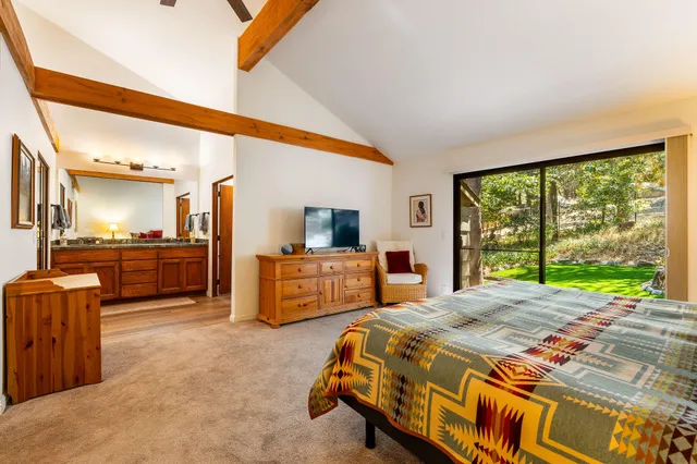 a view of a chairs and table in the wooden deck