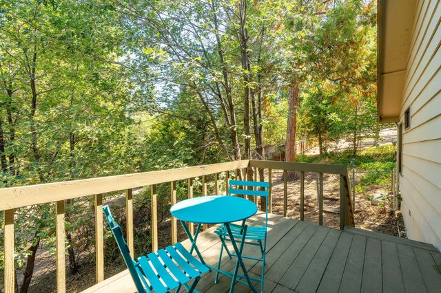 a workspace with furniture and a window