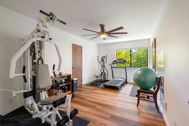 a view of a chairs and table in the patio