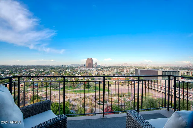 a view of a terrace with a lake view