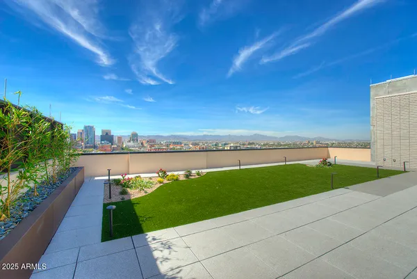 a view of a terrace with a garden