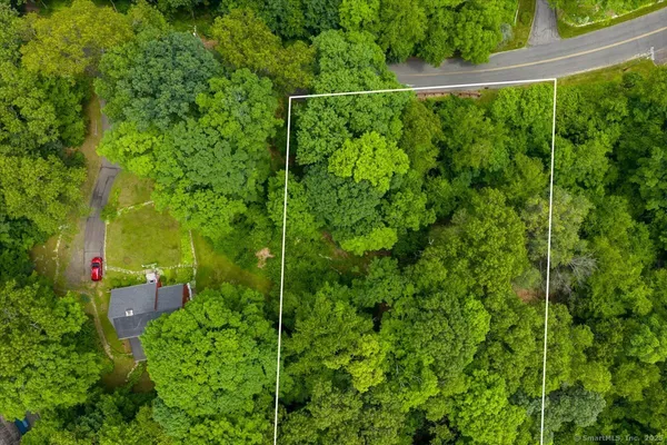 a view of a yard from a balcony