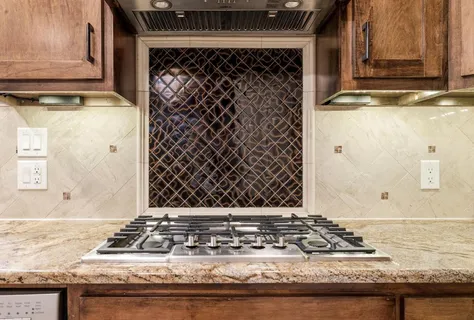 a view of a dining room with furniture and a chandelier