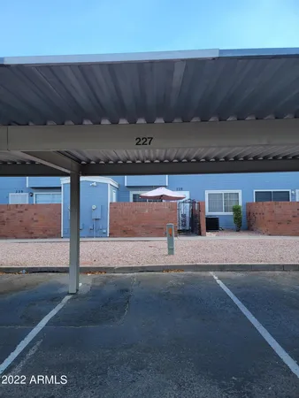 front view of a house with a street