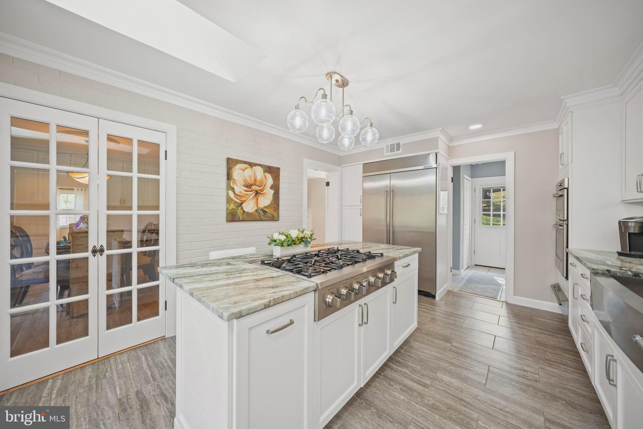 12704 Theresa Drive Silver Spring, MD 20904 - Photo 19 of 60 Double French glass door entrance to dining area