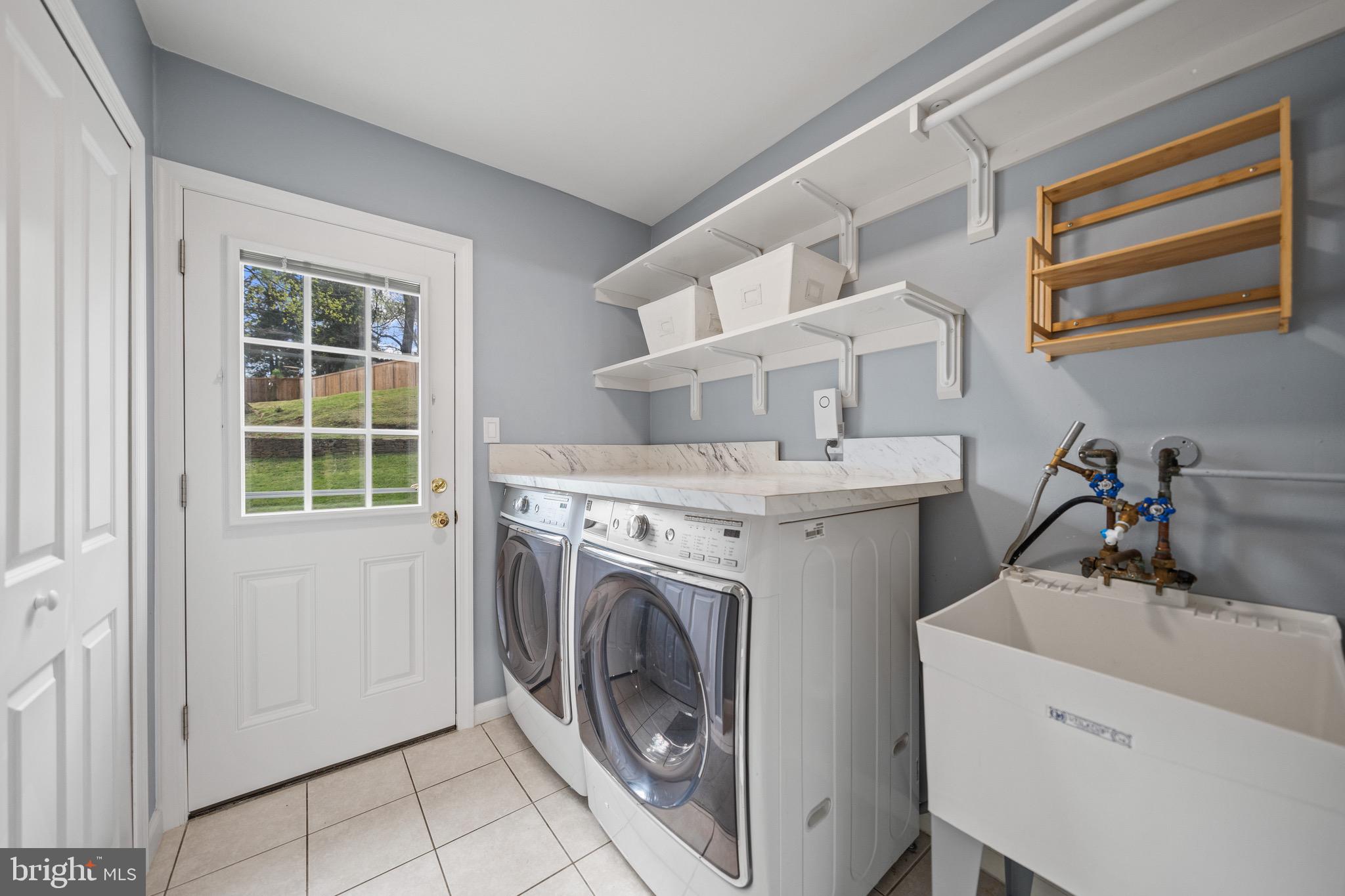 12704 Theresa Drive Silver Spring, MD 20904 - Photo 22 of 60 Laundry/mud room Backyard access