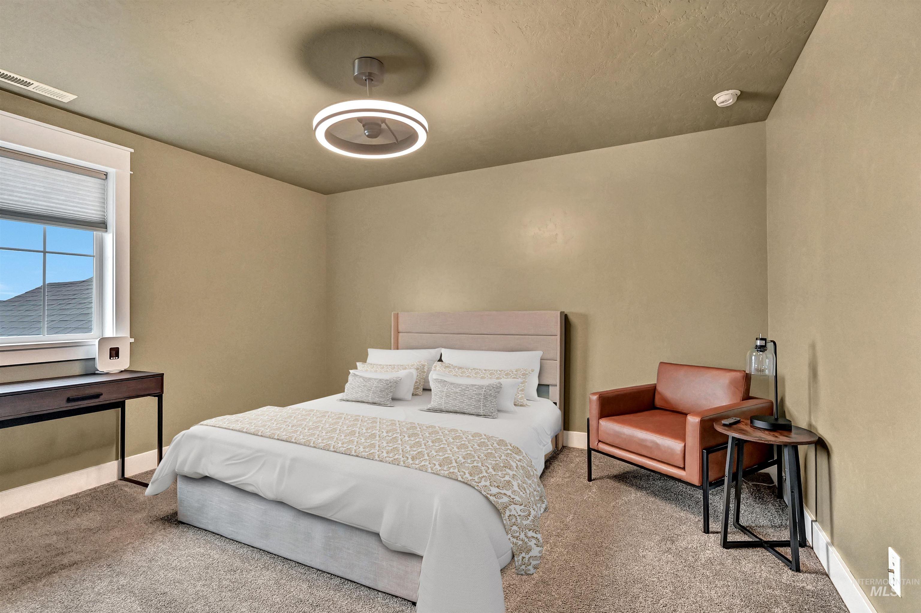 5802 South Wayland Way Meridian, ID 83642 - Photo 24 of 35 Bedroom featuring light carpet and expansive windows