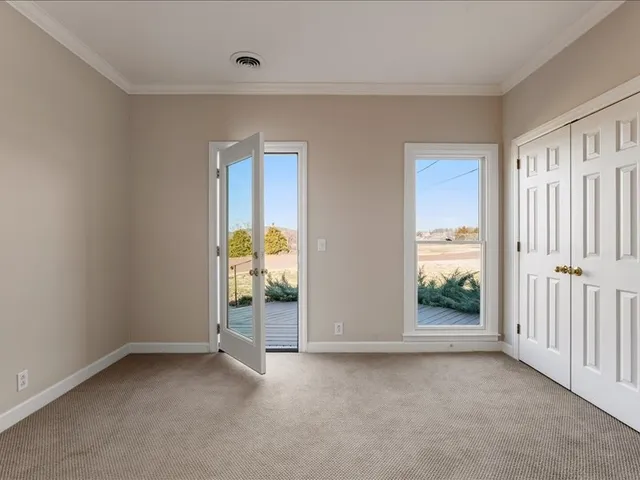 a bathroom with a toilet a sink and a shower