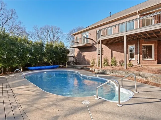 a view of a building with a swimming pool