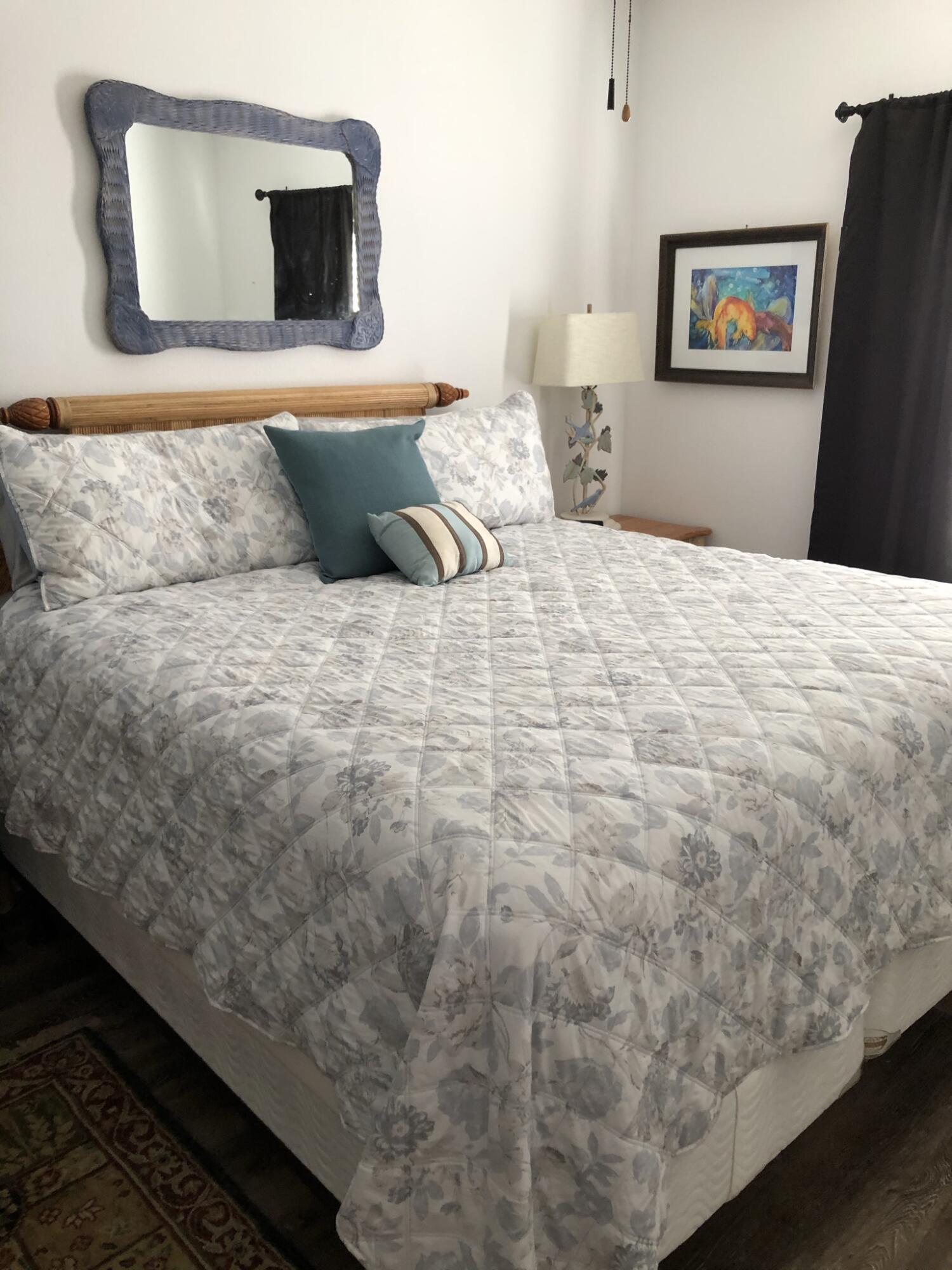 3754 West County Highway 30A, Unit 3 Santa Rosa Beach, FL 32459 - Photo 6 of 15 a bedroom with a bed and a flat screen tv