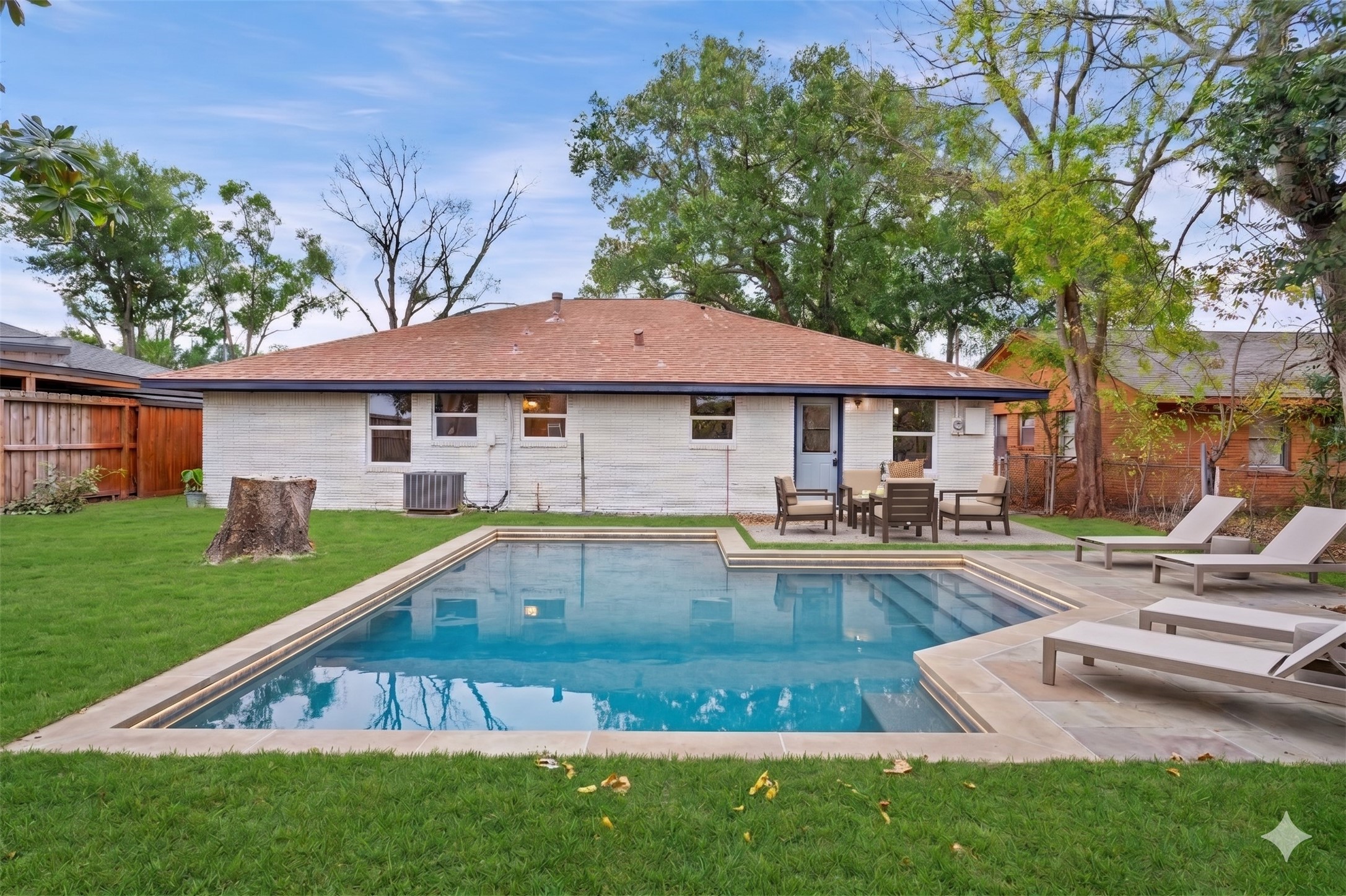 10127 Tolman Street Houston, TX 77034 - Photo 25 of 27 Virtual Staging image a pool and patio set to enjoy with family and friends to entertain
