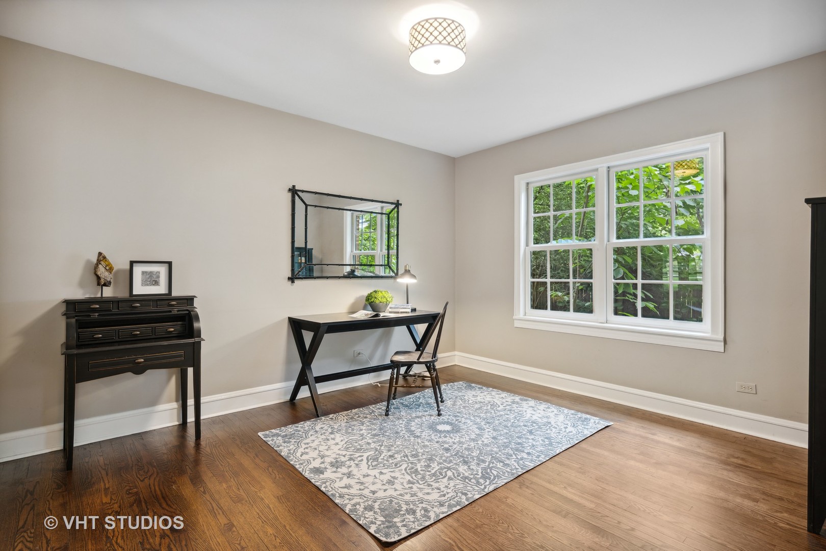 615 Riford Road Glen Ellyn, IL 60137 - Photo 13 of 33 a view of a workspace with furniture and a window