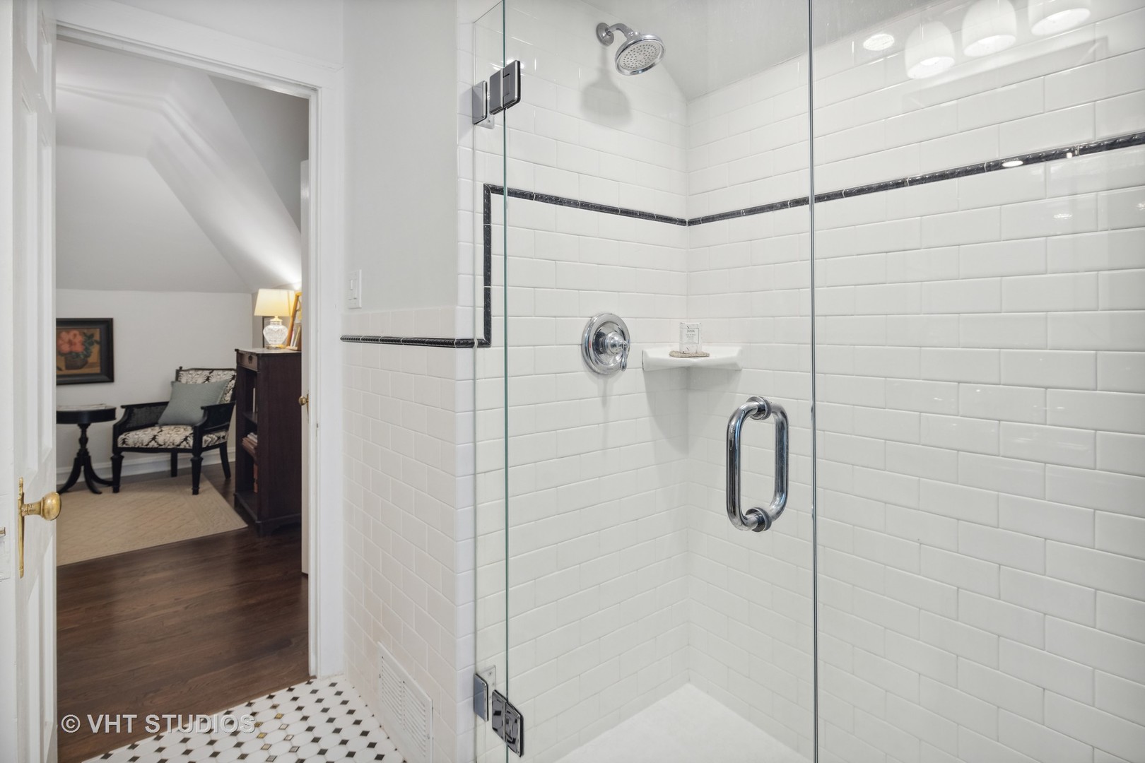 615 Riford Road Glen Ellyn, IL 60137 - Photo 19 of 33 a bathroom with a glass shower door and a glass door