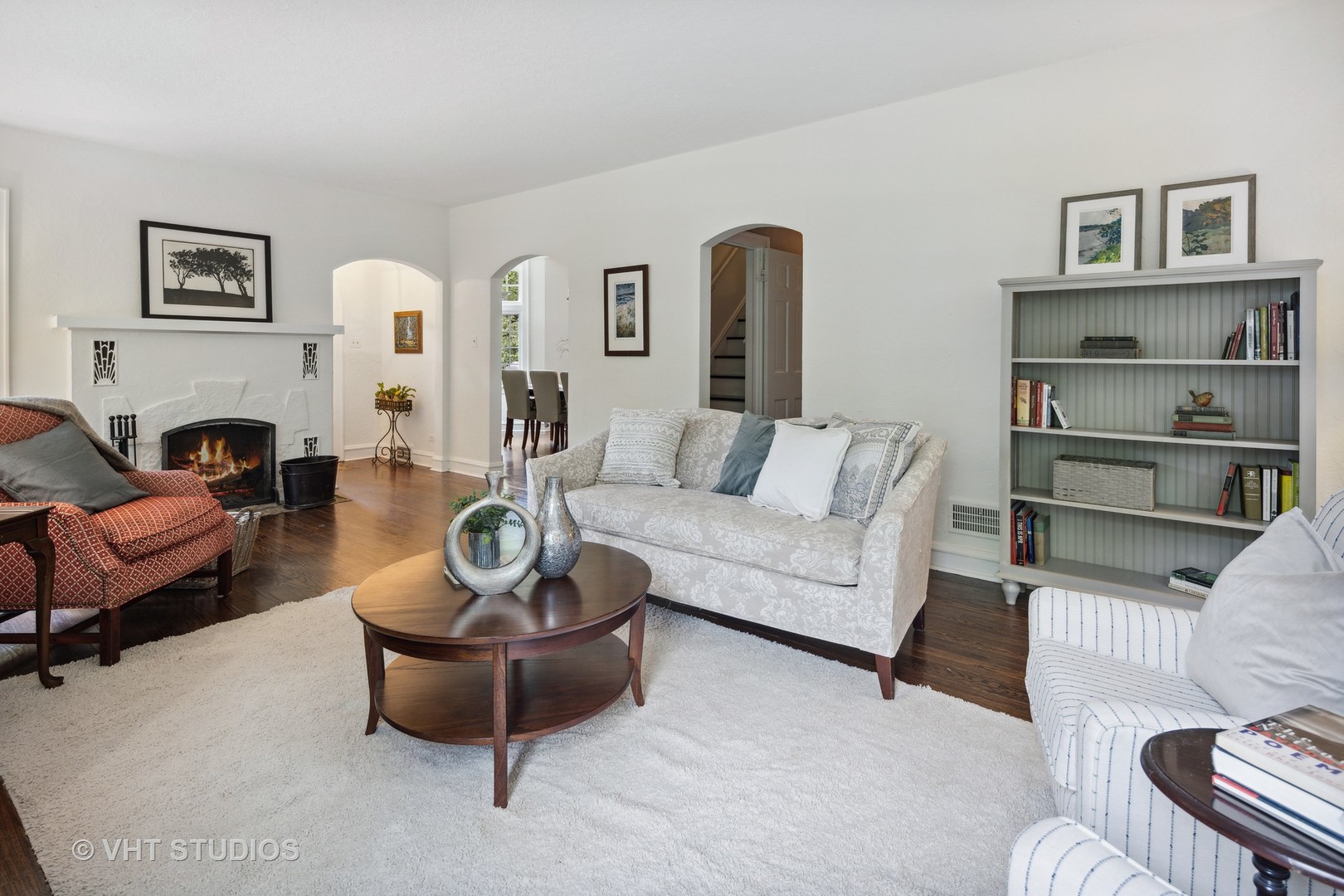 615 Riford Road Glen Ellyn, IL 60137 - Photo 6 of 33 a living room with furniture and a fireplace