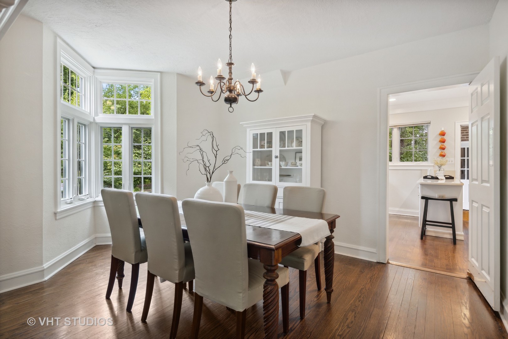 615 Riford Road Glen Ellyn, IL 60137 - Photo 8 of 33 a view of a dining room with furniture window and wooden floor