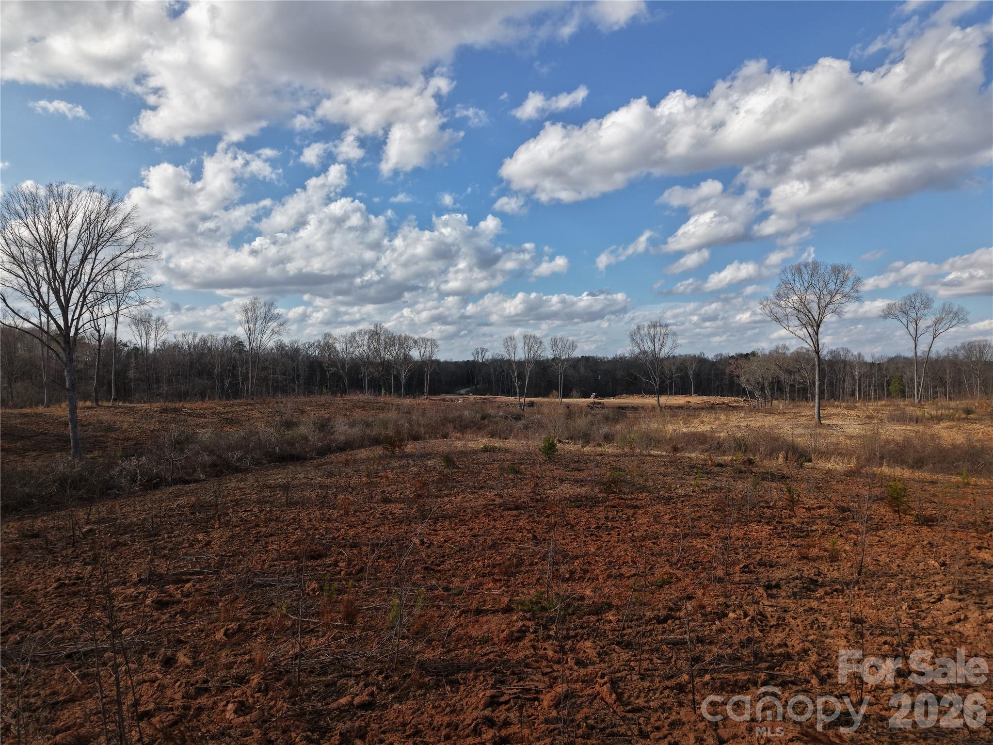 6802 West Duncan Road Indian Trail, NC 28079 - Photo 10 of 10 a view of a yard with wooden fence