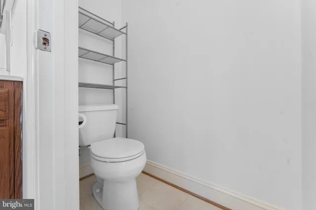 a bathroom with a toilet and a sink
