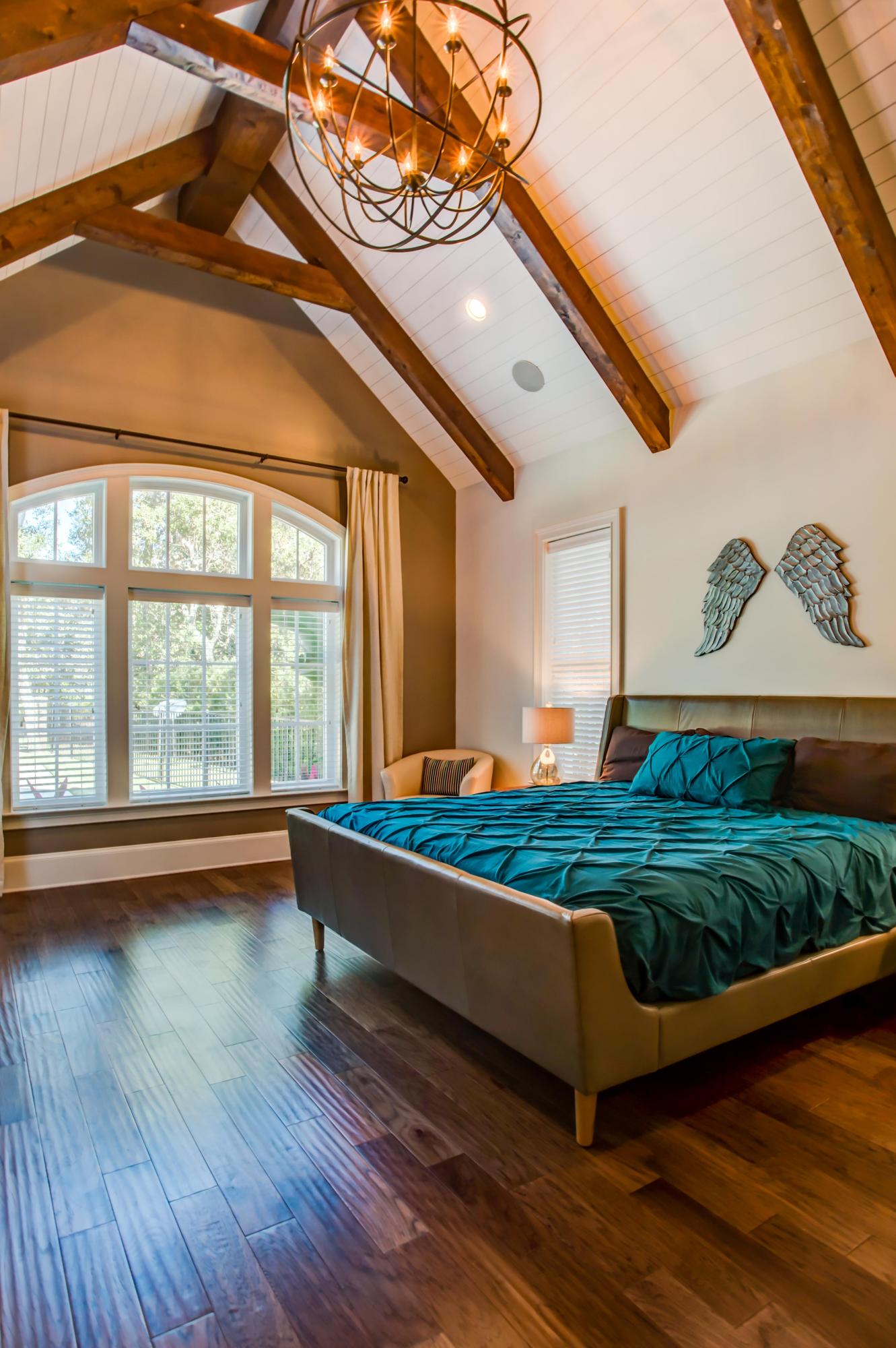 239 Mattie's Way Destin, FL 32541 - Photo 18 of 53 a view of room with window and wooden floor